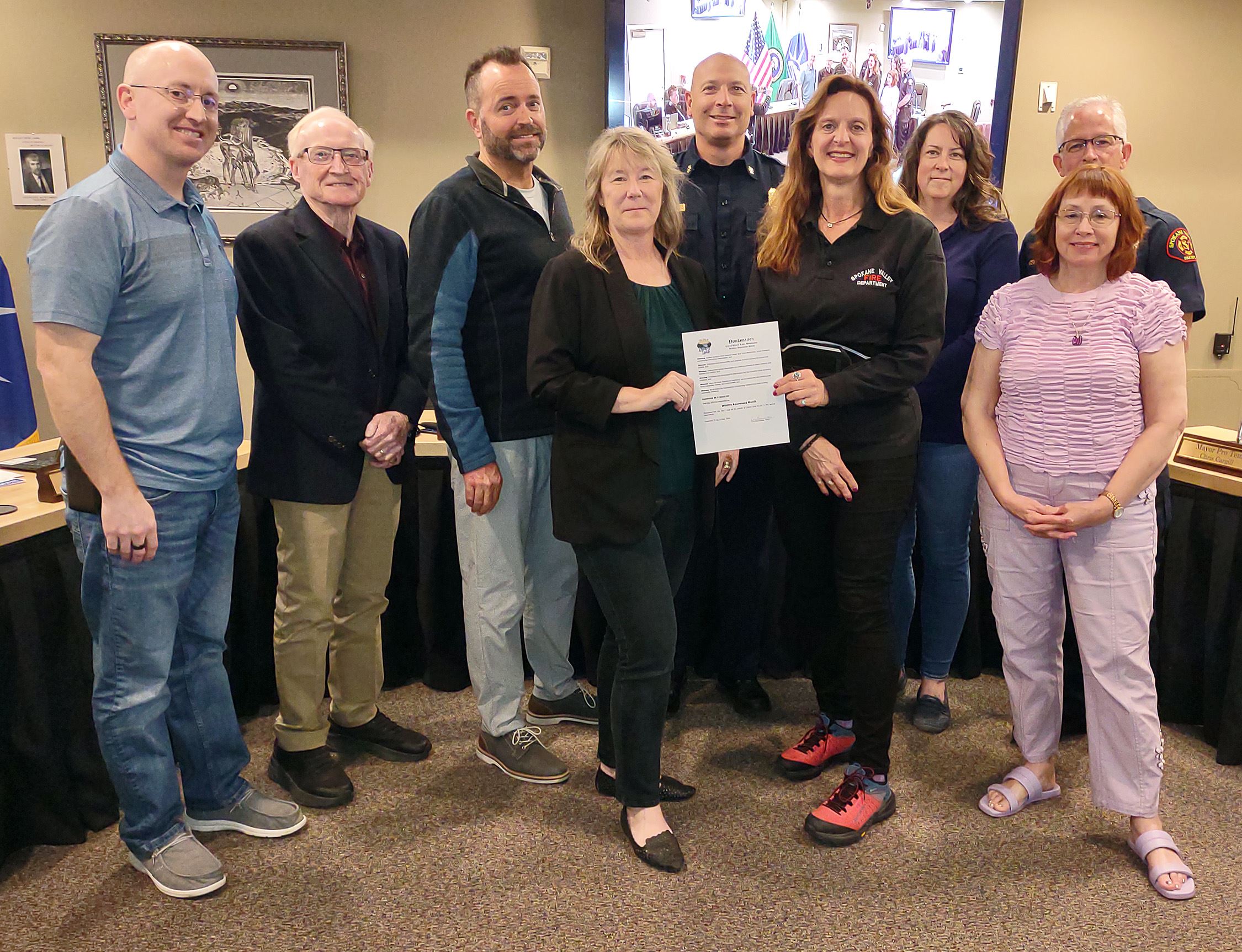City Council, mayor, and SVFD members with proclamation